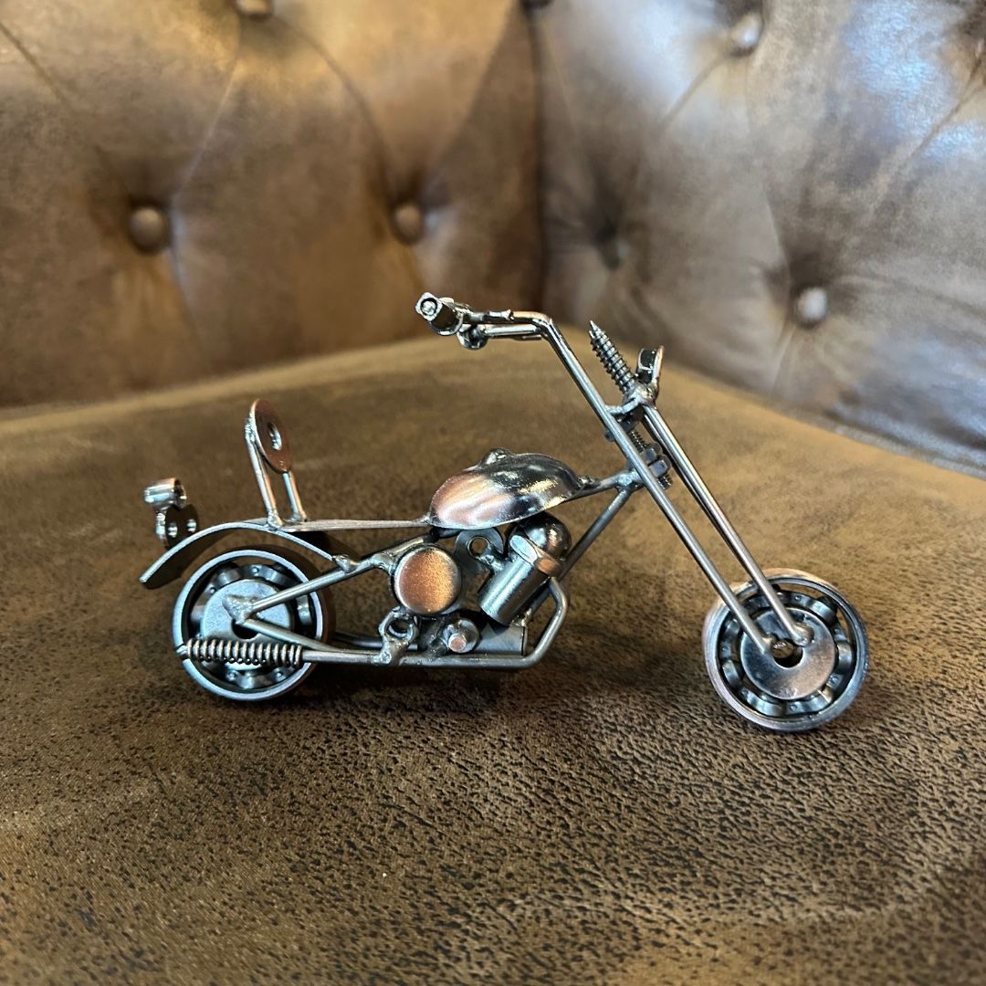 Small iron motorcycle model.